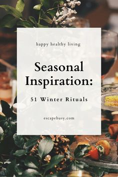 a table topped with plates and glasses filled with food, flowers and greenery text reads happy healthy living seasonal inspiration winter rituals