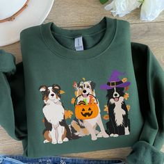 Australian Shepherds ready to Trick or Treat! .: Made with a medium-heavy fabric blend of 50% cotton and 50% polyester (8.0 oz/yd² (271.25 g/m this sweatshirt feels cozy and is the perfect choice for those colder months. .: The classic fit along with the crew neckline delivers a comfy wearing experience with a clean-cut style. Meanwhile, the double-needle stitching at the shoulder, armhole, neck, waistband, and cuff seams add top-tier durability.  .: Say goodbye to itchiness thanks to the gray, Cotton Dog Print Sweatshirt For Fall, Australian Shepherd Embroidery, Aussie Mom Shirt, Fall Cotton Sweatshirt With Dog Print, Australian Shepherd Sticker, Cotton T-shirt With Dog Print For Fall, Long Sleeve Dog Print T-shirt For Fall, Australian Shepherd Memes Funny, Australian Shepherd