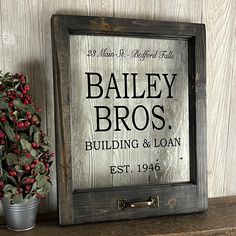 Journey back to Bedford Falls with the Bailey Brothers! This "It's a Wonderful Life" wall art is inspired by the classic and heart-warming 1946 movie. Bring a little bit of vintage, small town America to your home! For more items inspired by this and other beloved holiday classics, see all our Christmas inventory at https://www.etsy.com/shop/SecondChanceArt?ref=seller-platform-mcnav§ion_id=39222503 Hand crafted from vintage style glass and new wood, this unique art will make a special addition to your holiday decor! We make the frames in small batches from solid wood, and finish them with water-based stains.  We cut and install pieces of vintage look glass.  Vinyl decals are cut and applied, and a reproduction window pull is added.  -Window frame has a dark finish -Vintage look window pull It’s A Wonderful Life Decorations, It’s A Wonderful Life Party Ideas, Bedford Falls, It’s A Wonderful Life, It's A Wonderful Life, Unique Holiday Decor, Small Town America, 2024 Ideas, A Wonderful Life