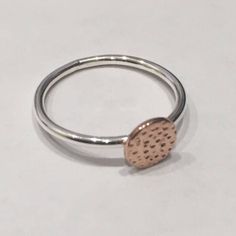 Fashionable 925 Sterling Silver Stacker Ring with 14k Rose Gold plated feature Hammer Disc. Available in 3 Sizes: #6, #7 & #8. Stacker Rings, Silver Roses, Stackable Rings, Silver Rose Gold, Rose Gold Plates, Or Rose, Favorite Jewelry, Silver Bracelet, Jewelry Rings