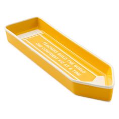 a yellow rectangular tray with white trim