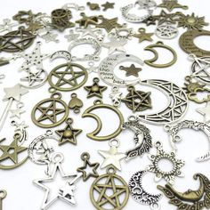 "74 pieces: Assorted celestial charms and pendants set Material: metal alloy Colors: antiqued silver and antiqued bronze Assorted sizes: .6\" to 1.9\"" Sun Moon Stars, Bronze Pendant, Moon Charm, Moon Star, Charm Set, Moon Pendant, Wholesale Beads, Diy Pendant, Star Charms