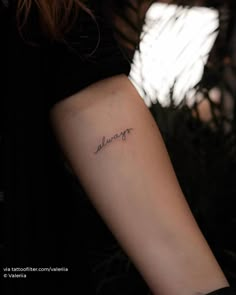 a woman's arm with the word always tattooed on her left arm and an inscription below it