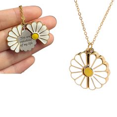 "This beautiful daisy necklace is made to last even through the rigors of everyday wear. With high-quality gold plating, this necklace will be perfect for showing your loved ones they are \"your sunshine\" any time of year. Our Sunshine Necklace features a daisy flower pendant with a hidden surprise...open the two sides of the locket to reveal a secret engraving: \"You Are Sunshine of My Life.\" then flip it over to the back to reveal, \"Forever\". It's the ideal gift for birthdays, anniversarie Daisy Gifts, You Are My Sunshine Necklace, Sunshine Necklace, Bff Bracelets, Daisy Pendant, Modern Gold Jewelry, Daisy Jewelry, Presents For Best Friends, Pretty Jewelry Necklaces