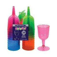 three different colored plastic bottles and a wine glass with a label on the top that says bright lights