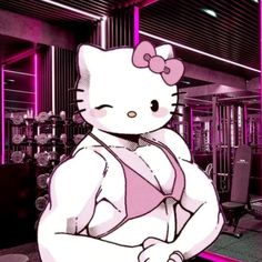 hello kitty is standing in the gym with her arms crossed