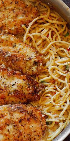 some chicken and pasta in a pan on a table