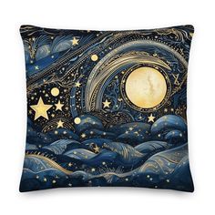 a decorative pillow with stars and moon on the night sky above waves in blue tones