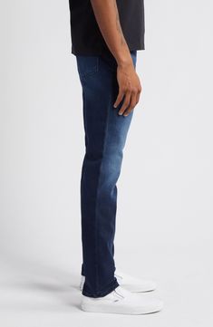 Easy to work into your everyday wardrobe, these slim-tailored jeans are made from TRANSCEND VINTAGE stretch denim in a lived-in dark wash. 33" inseam; 14" leg opening; 9 1/2" front rise; 14" back rise (size 32) 93% cotton, 5% polyester, 2% spandex Machine wash, line dry Imported Classic Dark Wash Slim Bottoms, Classic Slim Dark Wash Bottoms, Dark Wash Slim Straight Fit Jeans, Classic Slim Fit Dark Wash Jeans, Dark Wash Straight Slim Fit Jeans, Non-stretch Slim Jeans With Pockets, Tailoring Jeans, Everyday Wardrobe, Slim Fit Jeans