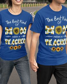 two people walking down the street holding hands and wearing matching t - shirts that read the best kind of mom raises a teacher