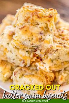 a stack of baked butter dips on top of a white plate with text overlay