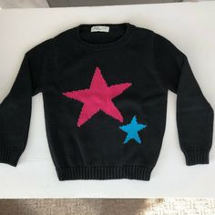 Pinc Premium Girls (5) Black L/sleeve Pullover Sweater W/Red Star. Condition is Pre-owned. Very good Condition. Black Star Print Top For Winter, Star Sweater Y2k, Half And Half Sweater With Stars, Chunky Sweater Stars, Black Star Print Sweatshirt For Winter, Black Casual Sweater With Star Print, Casual Black Sweater With Star Print, Star Printed Sweater, Casual Black Star Print Sweater