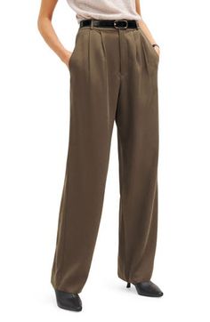 Exude polish from sunup to sundown in these wide-leg pants perfected by creased details and back welt pockets. 32 1/2" inseam; 21" leg opening; 14" front rise; 17 1/2" back rise (size 8) Belt not included 100% Tencel® lyocell Tencel lyocell is a sustainably produced fiber made with closed-loop processing Hand wash, line dry Made in the USA This product meets Nordstrom Sustainably Sourced Materials criteria: contains at least 30% sustainably sourced materials Converse Sneakers Outfit, Mason Pant, Dark Academia Outfits, Academia Outfits, High Waist Wide Leg Pants, Boat Neck Tops, French Women, Fashion People, High Rise Pants