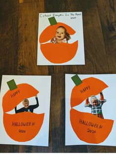 three pumpkins cut out to look like children's faces with the words happy and happy on them