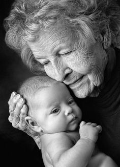 an older woman holding a baby in her lap with the caption, one day you'll be just a memory for some people do your best to be a good one