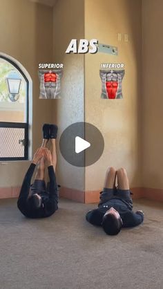 two people doing exercises on the floor in front of a mirror with their hands up