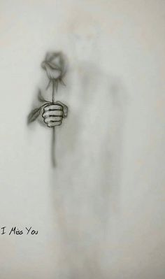 a drawing of a person holding a rose in their hand with the words i miss you written on it