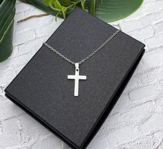 "This is a beautiful shiny small double sided minimalist stainless steel 22 mm cross necklace.  The cross measures 7/8 inch without bail and 1 inch with bail. Additional stainless steel cross necklaces in my shop: https://www.etsy.com/shop/AlwaysPrettyThings?ref=seller-platfosgrm-mcnav&search_query=stainless+steel+cross See all my stainless steel necklaces: https://www.etsy.com/shop/AlwaysPrettyThings?ref=seller-platform-mcnav§ion_id=21348272 Stainless steel is a darker metal than the bright ste Stainless Steel Cross Pendant Necklace For Gift, Stainless Steel Cross Pendant Necklace As Gift, Gift Stainless Steel Cross Pendant Necklace, Minimalist Hypoallergenic Cross Jewelry, Minimalist Stainless Steel Cross Necklace As A Gift, Minimalist Silver Stainless Steel Cross Necklace, Minimalist Stainless Steel Cross Necklace For Gift, Minimalist Stainless Steel Cross Pendant Necklace, Minimalist Personalized Cross Necklace