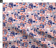 an orange and blue fabric with small images on it