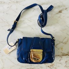 100% Leather Solid Blue Classic Metal Accents Logo Accents 9" Length, 6.5" Height, 3.5" Depth Dust Bag Not Included. Pet Free & Smoke Free Environment. Classic Metal, Metal Accents, Small Crossbody Bag, Small Crossbody, Bags Designer Fashion, Blue Bags, Michael Kors Bag, Cobalt Blue, Blue Gold