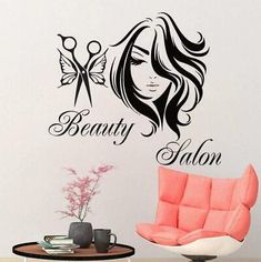 a wall decal with the words beauty salon and a woman's face on it