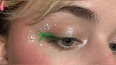 Snowflake makeup, ribbon makeup, bow makeup, graphic eyeliner, bow eyeliner Snowflake Freckles, Bow Eyeliner, Ribbon Eyeliner, Snowflake Eyeliner, Christmas Eyeliner Looks, Holiday Eyeliner, Christmas Eyeliner, Ribbon Makeup, Snowflake Makeup