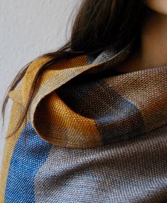 This beautiful shawl is handwoven by Irene from Vienna on a wooden handloom machine. The head comb used for the shawl measures 40/10, 40 threads every 10 centimeters. The shawl is made of high-quality materials, combining 50% yak and 50% silk. The yarns are dyed manually using plant-based colors. It is the combination of these three elements - yak, silk, and natural color - which makes the shawl glow in its own light. It is a real revelation as the shawl shows different shades depending on the l Luxury Handloom Raw Silk Shawl, Handwoven Shawls, Artisanal Design, The Head, Handmade Design, Vienna, Natural Color, Comb, Knitted Scarf