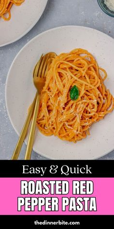 easy and quick roasted red pepper pasta on a white plate with two gold forkes