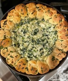 a pot pie with spinach and cheese in it