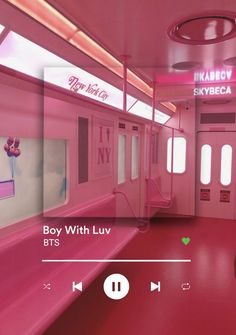 a pink room with lots of windows and red flooring, along with the words boy with luv bts