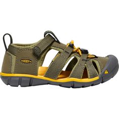 The Seacamp II CNX Sandal is a versatile piece of footwear our young ones can wear anywhere. Its open polyester upper ensures fresh feet throughout the day while also keeping them comfortable thanks to how soft it is. And speaking of comfort, the EVA footbed has ample cushioning for long days of riverbed exploring with the parents. Green Breathable Synthetic Sandals, Comfortable Slip-resistant Sport Sandals For Outdoor Activities, Green Sports Sandals With Rubber Sole, Green Sporty Sandals With Rubber Sole, Outdoor Open Toe Sneakers With Rubber Sole, Green Comfortable Slip-resistant Sandals, Comfortable Green Slip-resistant Sandals, Casual Non-slip Nylon Sandals, Green Casual Sports Sandals