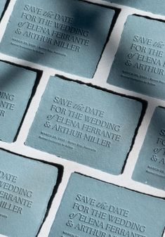 wedding save - the - date cards laid out in rows on top of each other