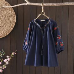 Women's V-Neck Embroidery Floral Mid-Sleeve Pullover Shirt Cotton Blouse Casual Embroidered V-neck Top For Fall, Casual V-neck Blouse With Embroidered Sleeves, Cotton V-neck Blouse With Embroidered Hem, Casual V-neck Top With Embroidered Sleeves, Folk Style V-neck Blouse With Embroidered Neckline, Casual V-neck Blouse With Embroidered Hem, Casual Blouse With Floral Embroidery And Half Sleeves, Casual Long Sleeve Embroidered Blouse, Spring Floral Embroidered Half Sleeve Top