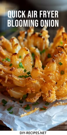 an air fryer is being used to make some fried onion rings with the words, quick air fryer blooming onion