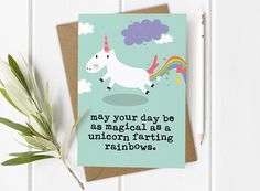 a card with an image of a unicorn on it and the words may your day be as magical as a unicorn flying rainbows