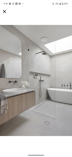 an image of a bathroom setting with white walls and flooring, including a bathtub