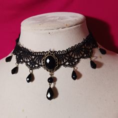 Nwot Vintage Victorian Gothic Black Lace Fashion Choker Necklace Water Drop Beads And Pendant Are Hard Durable Plastic And Have Good Weight To Them Brass Colored Hardware And Findings Closure Is Lobster Claw Style Clasp Necklace Is 13 Inches In Length And Adjustable With 2 Inch Long Extender Chain All Reasonable Offers Considered And Will Be Accepted Or Countered. **Notice** And Disclaimer For People With Allergies: I Live With A Smoker And My Items Do Come From A Pet Friendly Home. Great Care I Victorian Goth Necklace, Adjustable Vintage Black Choker, Vintage Black Beaded Necklaces For Party, Vintage Black Choker For Gifts, Vintage Black Beaded Party Necklace, Vintage Black Beaded Jewelry, Vintage Black Beads Choker Gift, Vintage Black Choker For Party, Vintage Black Beads Choker For Gift