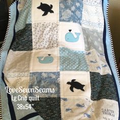 a quilted blanket with sea animals on it