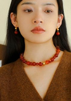 Product Information: Process: 18K gold plated Material: copper/925 silver needle/red agate Size: Necklace inner circumference 40-45cm (carnelian size 10mm/14mm) Bracelet 18-20cm (red agate size 10mm-10.5mm) Earrings is about 3.2cm (carnelian size 12mm) Weight: 82g,23g,3g Red Carnelian Jewelry With Faceted Beads, Elegant Beaded Carnelian Jewelry, Red Agate Gemstone Beaded Necklace, Elegant Carnelian Beaded Necklace With Natural Stones, Red Agate Jewelry With Natural Stones, Elegant Beaded Necklace With Carnelian Stones, Red Carnelian Bead Jewelry, Red Agate Beaded Necklaces, Elegant Carnelian Beaded Necklace With Round Beads