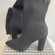 New, Nwot (New Without Tags), Newbella Mousse Fit Pointed Toe Sock Boots, Black, Size Eu 38 | Us 7. Stretchy Ribbed Topline, Elastic Knitted Upper, Steady Heels, Feminine Pointed Toe. Mousse Smooth - Like A Second Skin: Soft & Stretchy, Breathable, Wrinkle Resistant, Zero Waste. Https://Www.Shopnewbella.Com/Products/Newbella-Chunky-Heel-Pointed-Toe-Sock-Boots Black Mid-calf Boots For Winter, Medium Width, Black Mid-calf Boots Medium Width For Winter, Winter Stretch Boots With Round Toe, Casual Stretch Boots With Round Toe, Casual High Ankle Fitted Booties, Black Wide Calf Heeled Boots For Winter, Winter Stretch Ankle Boots, Black Mid-calf Boots Medium Width, Trendy Black Mid-calf Heeled Boots