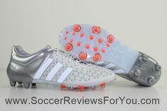 a pair of soccer shoes with spikes on them