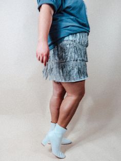 Get ready for all of your favorite Festivals in this fringe mini skirt! - Features a white underskirt with three tiers of gray fringe with rhinestones all across, a side zipper & clasp closure. - Runs a bit small | Model is 5'10" wearing a size 3X - Paired here with our Neon Moon Oversized Tee *Due to screens & filters color may vary slightly to photos* Fringe Mini Skirt, Neon Moon, Fringe Festival, Photo Processing, Fringe Skirt, Three Tier, Oversized Tee, Side Zipper, Mini Skirt