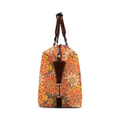 • Orange Boho Bag: Showcases an elegant and intricate orange and brown bohemian floral pattern, perfect for those who love 70s-inspired designs.• 70s Boho Travel Bag: A stylish duffel bag that captures the essence of the 70s hippie floral vibe.• 70s Hippie Floral Duffel Bag: Features a unique floral pattern, making it a standout piece for any boho fashion enthusiast.• Flight Bag: Meets carry-on size requirements with dimensions of 19.7" x 8.5" x 14.5", ideal for air travel.• Waterproof Carry-On Brown Floral Print Tote Shoulder Bag, Brown Floral Print Bag For Everyday Use, Brown Floral Print Shoulder Bag For Travel, Brown Floral Print Shoulder Bag For Daily Use, Vintage Orange Tote Shoulder Bag, Brown Rectangular Bag With Floral Print, Vintage Brown Shoulder Bag With Floral Print, Vintage Travel Bags With Floral Print, Vintage Brown Bags With Floral Print