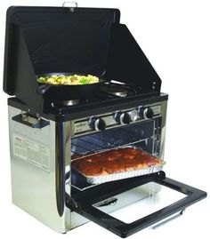 an open oven with food cooking in it