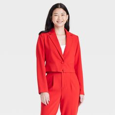 Add a pop of color to your wardrobe with this Crop Blazer from A New Day™. Made of recycled polyester with added rayon and spandex, this red blazer showcases front buttons for a timeless look. Tailored in casual fit, this cropped blazer pairs well with dress pants or jeans. A New Day™: Style that goes wherever you do. Red Casual Blazer For Business Casual, Red Business Casual Outerwear For Spring, Red Fitted Blazer For Career, Spring Business Casual Red Blazer, Tailored Red Career Blazer, Tailored Red Blazer For Career, Red Tailored Blazer For Career, Red Single Button Spring Blazer, Red Single Button Blazer For Spring