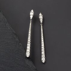 Ross-Simons - 1.50 ct. t. w. Diamond Linear Earrings in Sterling Silver. Long and stunning, linear earrings are all the rage. Set in sterling silver, 1.50 ct. t. w. round brilliant-cut diamonds twinkle as they swing and sway. Hanging length is 1 3/4". Post/clutch, diamond linear earrings. Diamond birthstones are the perfect gift for April birthdays. Formal Long Drop Diamond Linear Earrings, Classic Diamond Accents Linear Drop Earrings, Classic Cubic Zirconia Long Drop Linear Earrings, Classic Linear Earrings With Diamond Accents In Diamond White, Brilliant Cut Long Drop Earrings For Formal, White Gold Long Drop Diamond Earrings, Brilliant Cut Long Drop Earrings For Formal Events, Brilliant Cut Long Drop Earrings For Formal Occasions, Formal Long Drop Brilliant Cut Earrings