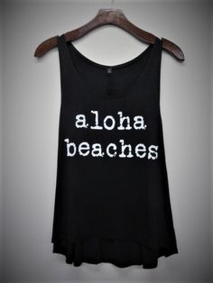 This is a very comfy women's racerback tank top made with 95% Rayon and 5% Spandex. It is really soft, and has a perfect vintage fit and feel for yoga or just going out. Fits true to size Made in the USA Ships in 1-2 business days Beach Tank Top With Letter Print, Beach Tank Top With Graphic Print, Trendy Letter Print Tank Top For Vacation, Beach Stretch Tank Top With Graphic Print, Stretch Graphic Print Tank Top For Beach, Trendy Sleeveless Tank Top For Vacation, Casual Stretch Tops For Vacation, Black Racerback Top For Vacation, Sleeveless Stretch Tops For Vacation