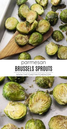 brussel sprouts on a baking sheet with a wooden spoon in it