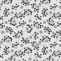 a black and white flower pattern on a gray background