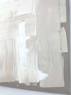 an abstract painting with white and gray colors